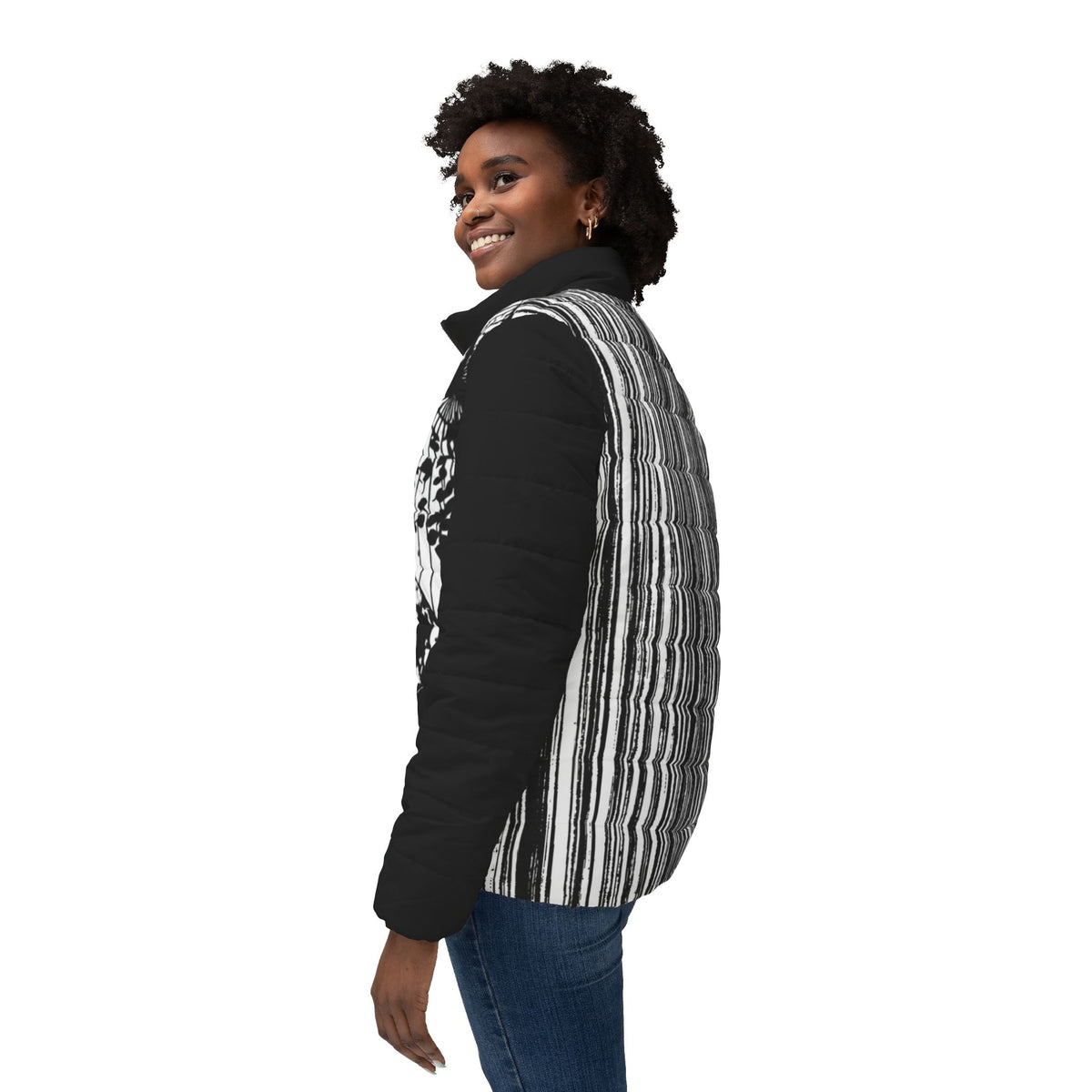 Three-quarter back view of woman wearing a black and white Japanese art jacket with striped rear print.