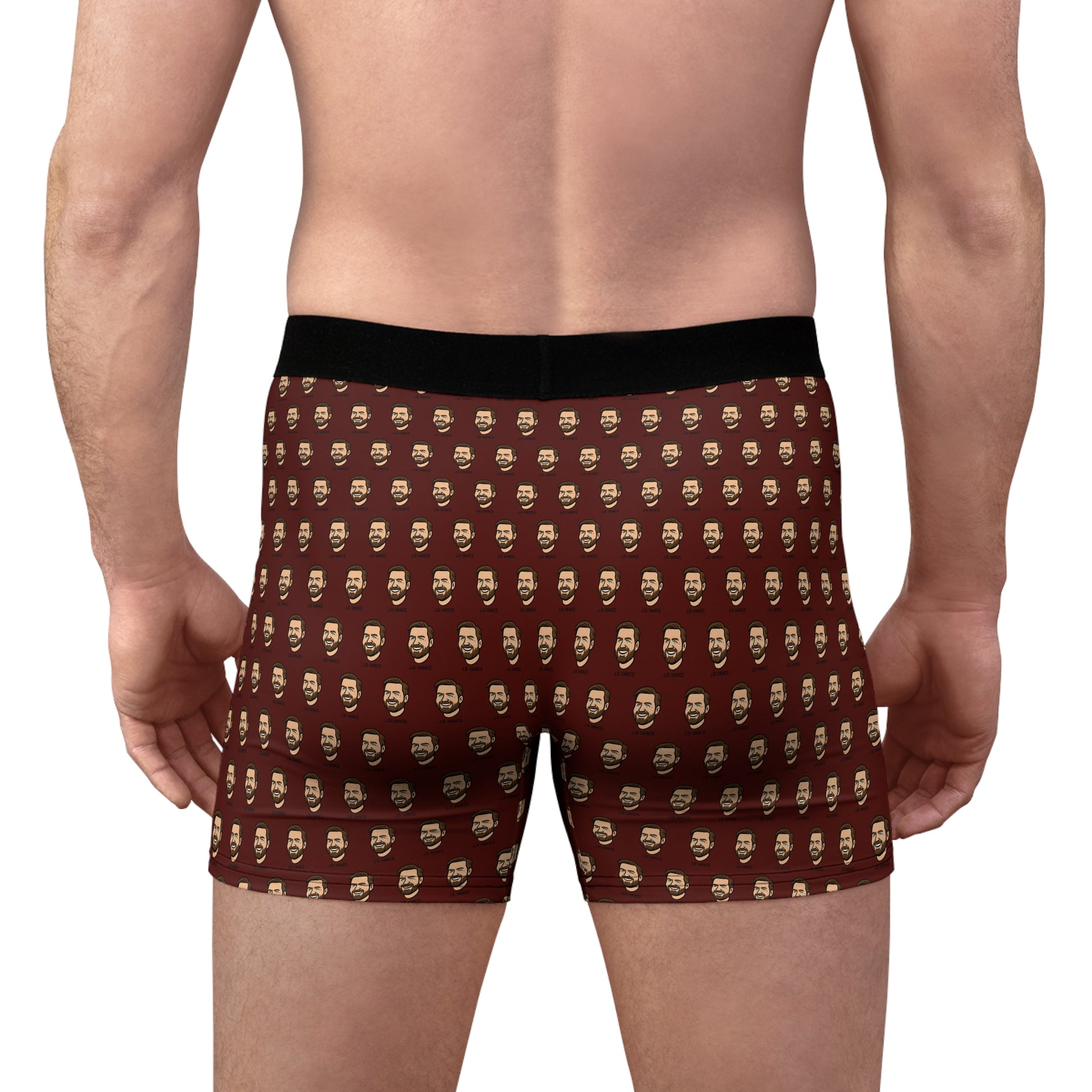 Back view of male model wearing brown JD Vance boxer briefs with repeating cartoon face pattern