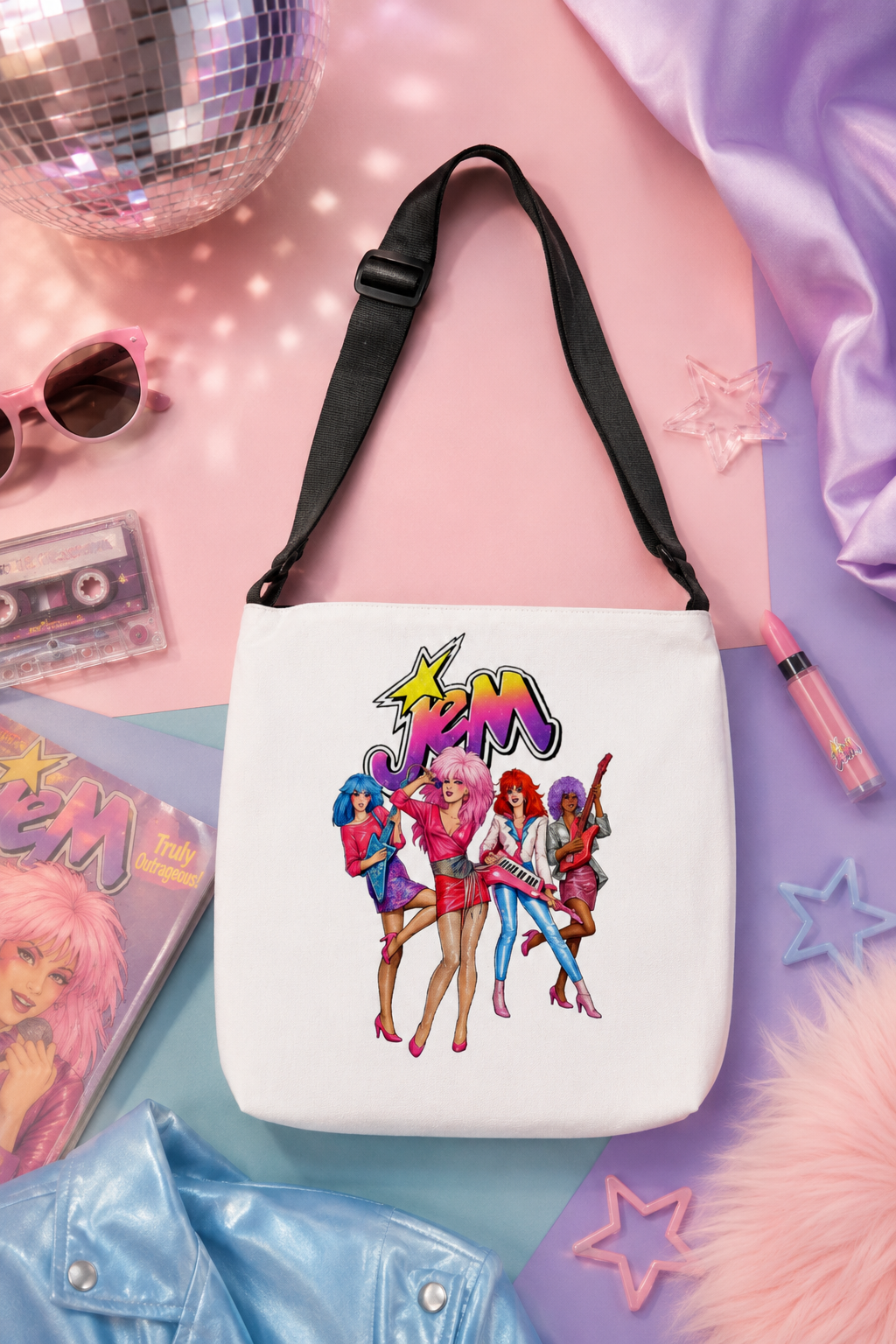 Jem and the Holograms tote bag styled in a soft pastel 1980s-inspired editorial flat lay