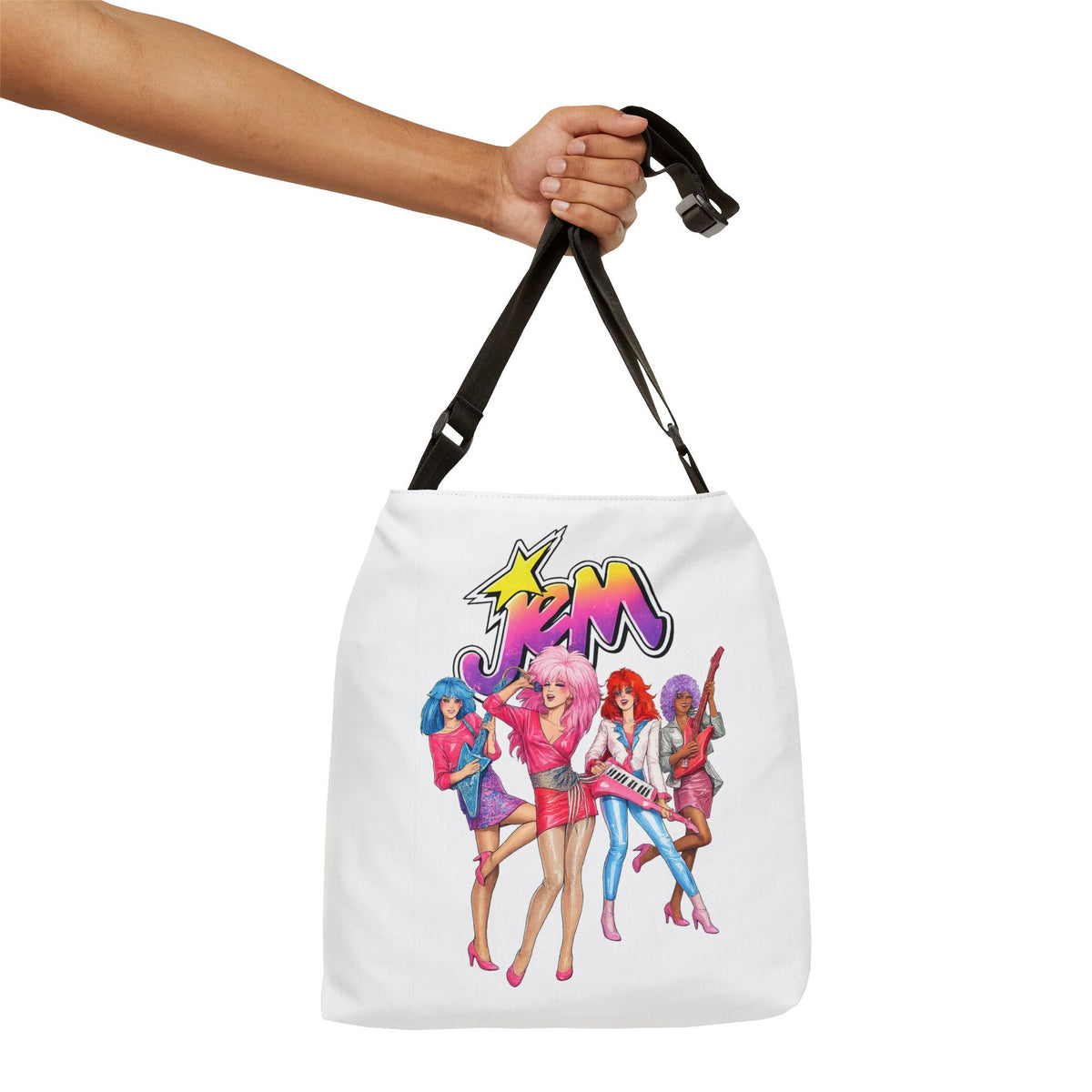 Jem and the Holograms tote bag held by its adjustable black shoulder strap