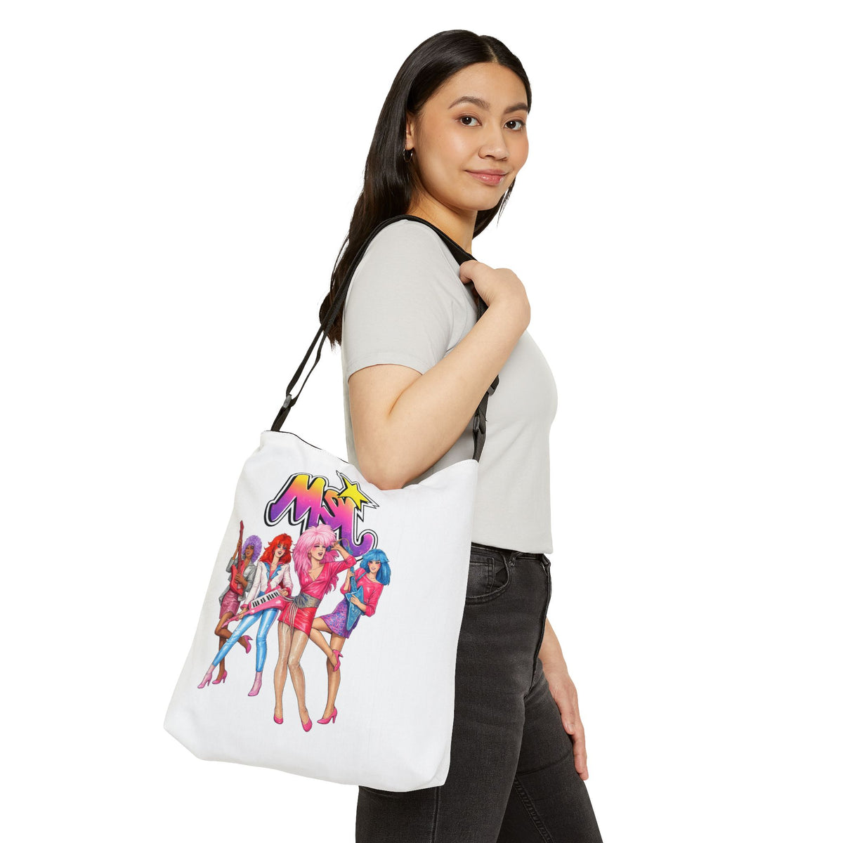 Female model wearing the Jem and the Holograms tote bag over her shoulder
