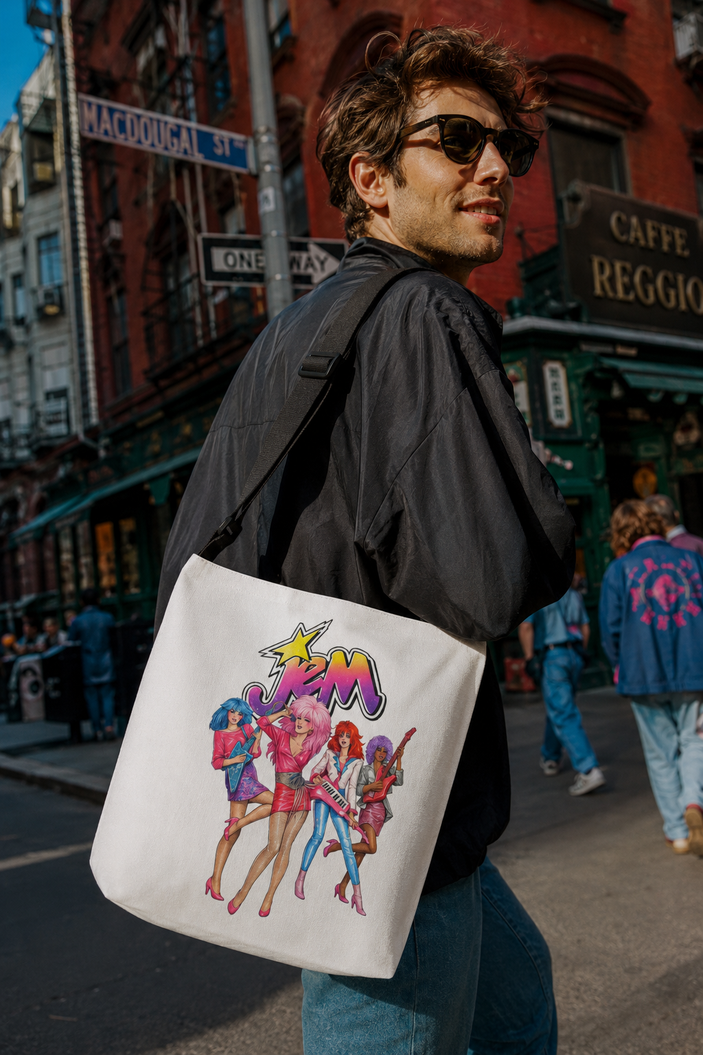 Man carrying a Jem and the Holograms tote bag in Greenwich Village New York City