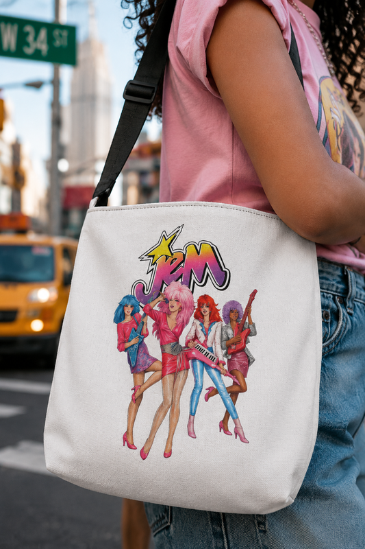 Woman carrying a Jem and the Holograms tote bag in a colorful New York City street-style look