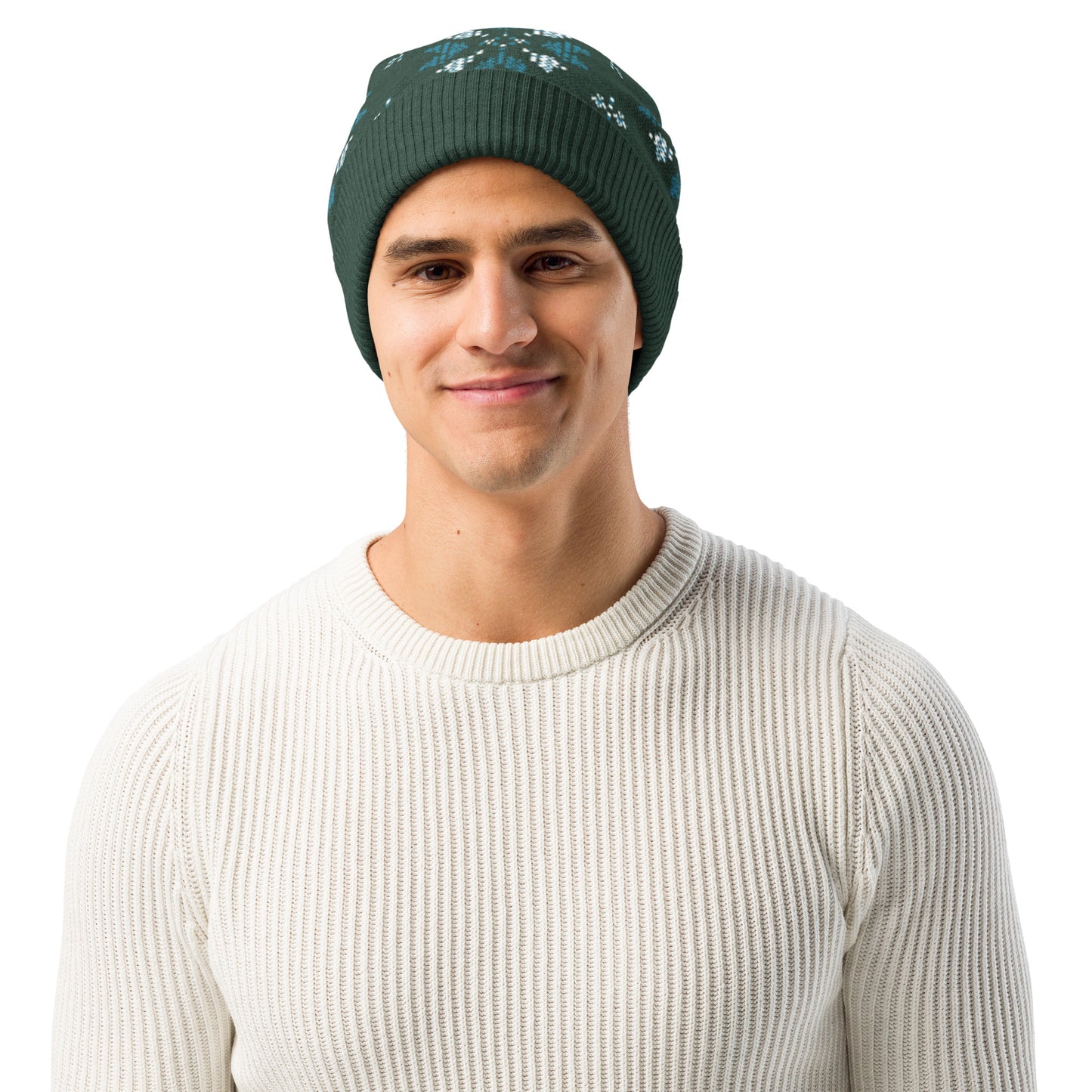 Studio view of a person wearing the dark green winter patterned beanie facing forward.