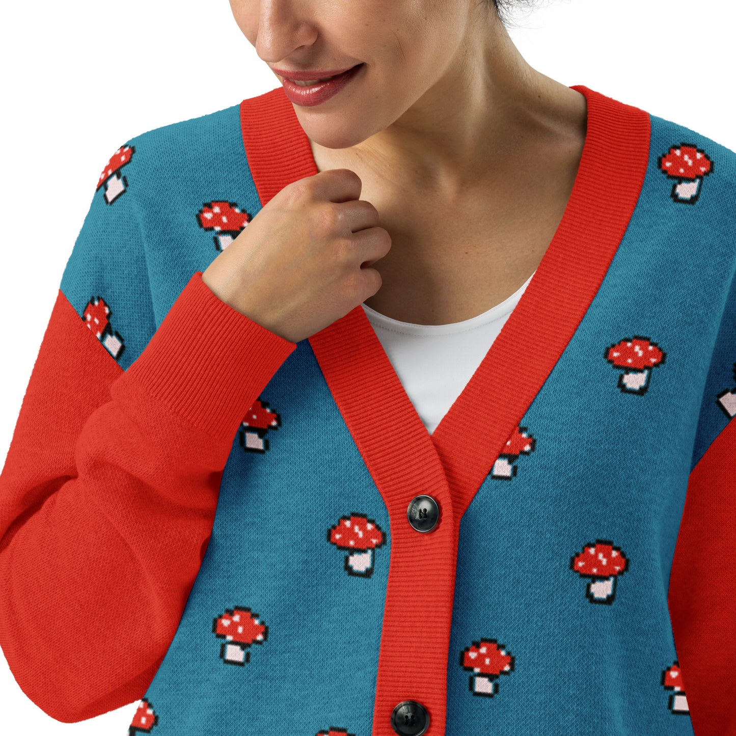 Woman wearing the pixel mushroom cardigan close up showing neckline and button area.