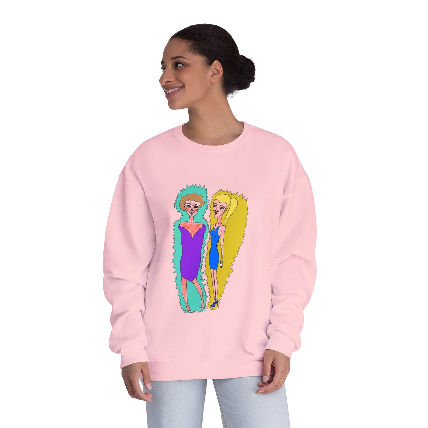 Female model wearing pink Lads Unisex Graphic Sweatshirt featuring colorful hand-drawn artwork.