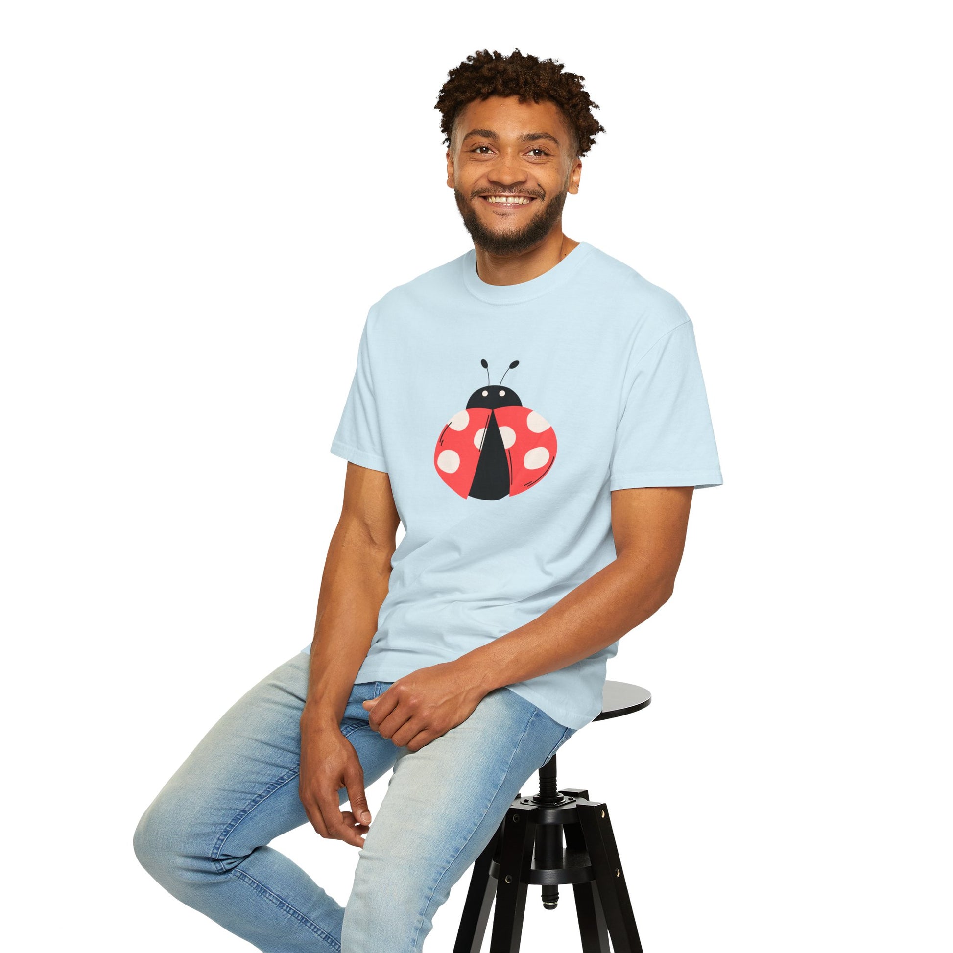 Man wearing light blue Ladybug Graphic Unisex T-Shirt