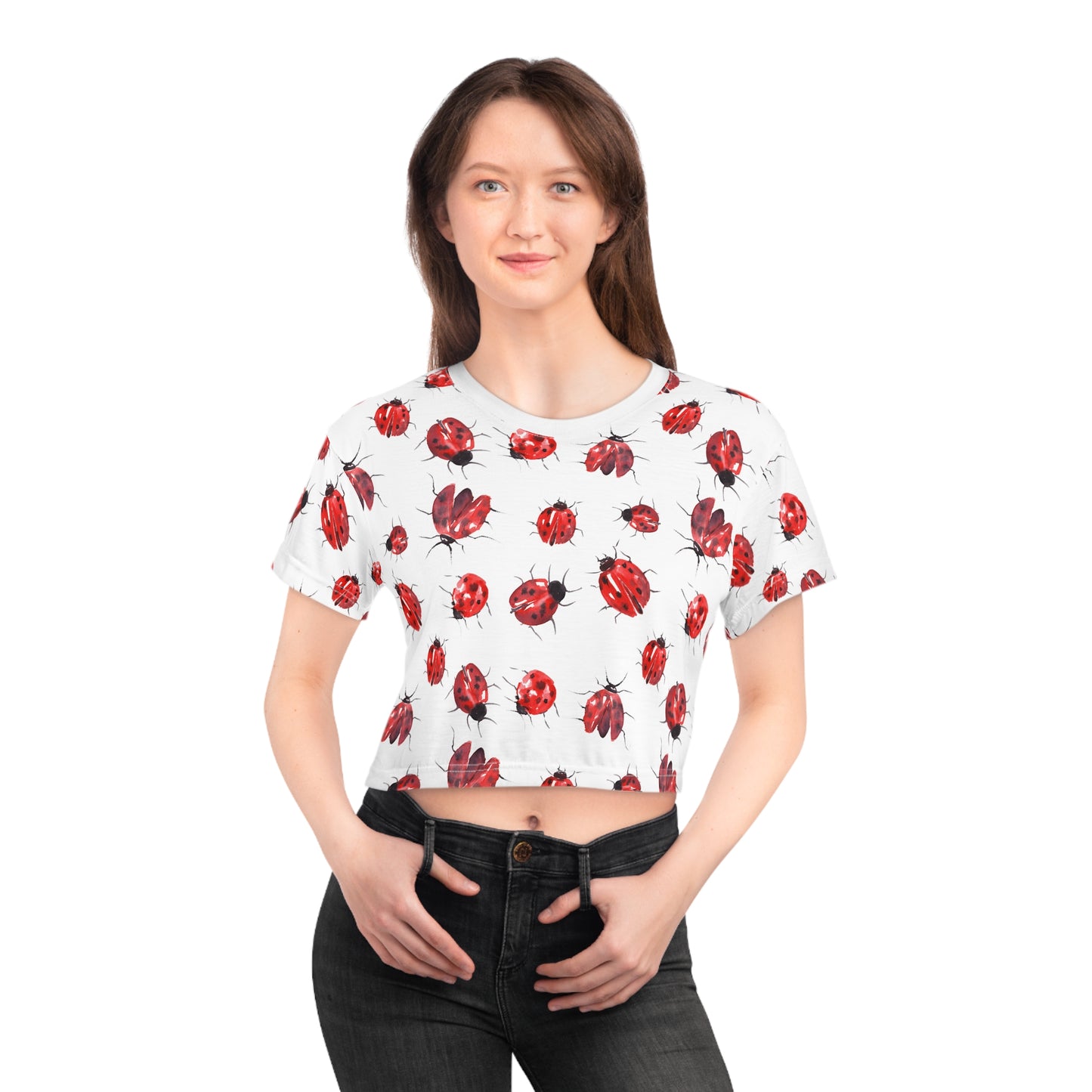 Female model wearing ladybug print crop top with playful spring streetwear styling