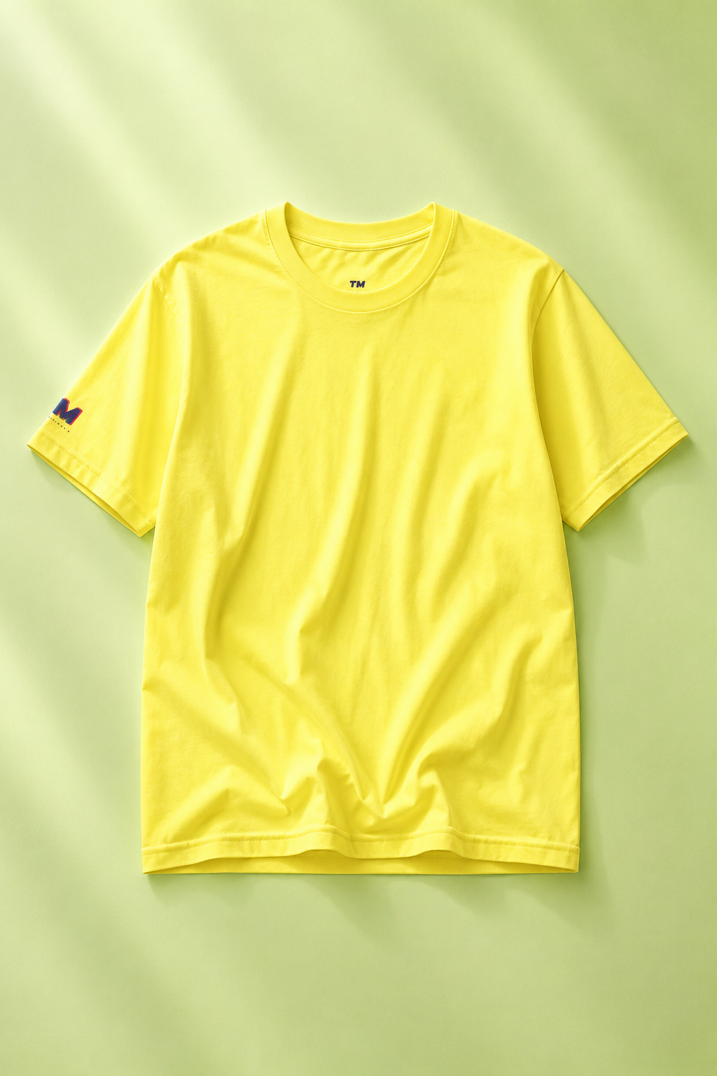 Editorial flat lay of a lemon yellow cotton T-shirt.
