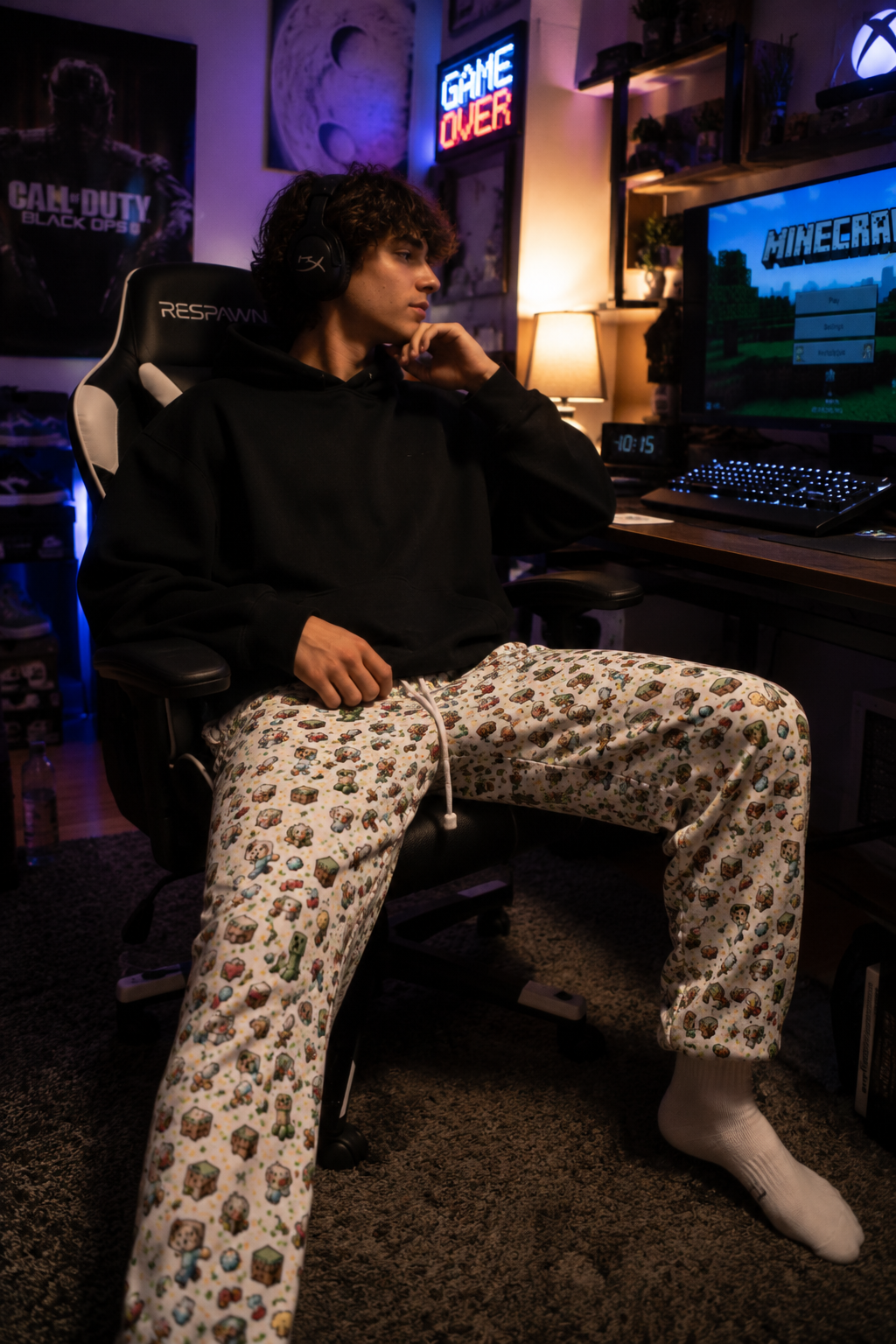 Close-up side view of Level Up Gamer Joggers showing detailed pixel gaming pattern.