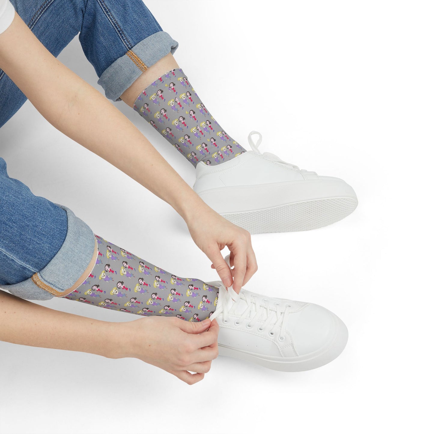 Close-up of Lily & Matthew patterned crew socks styled with white sneakers and casual streetwear fashion.