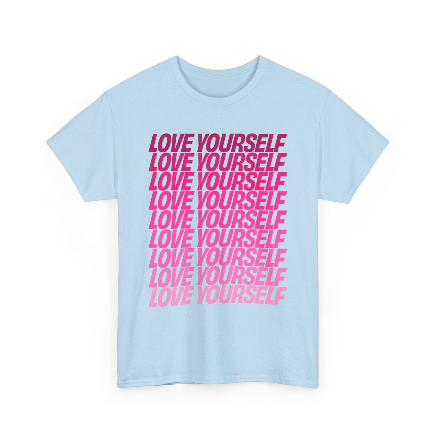 Front view of the Love Yourself graphic unisex T-shirt in light blue with bold pink typography.
