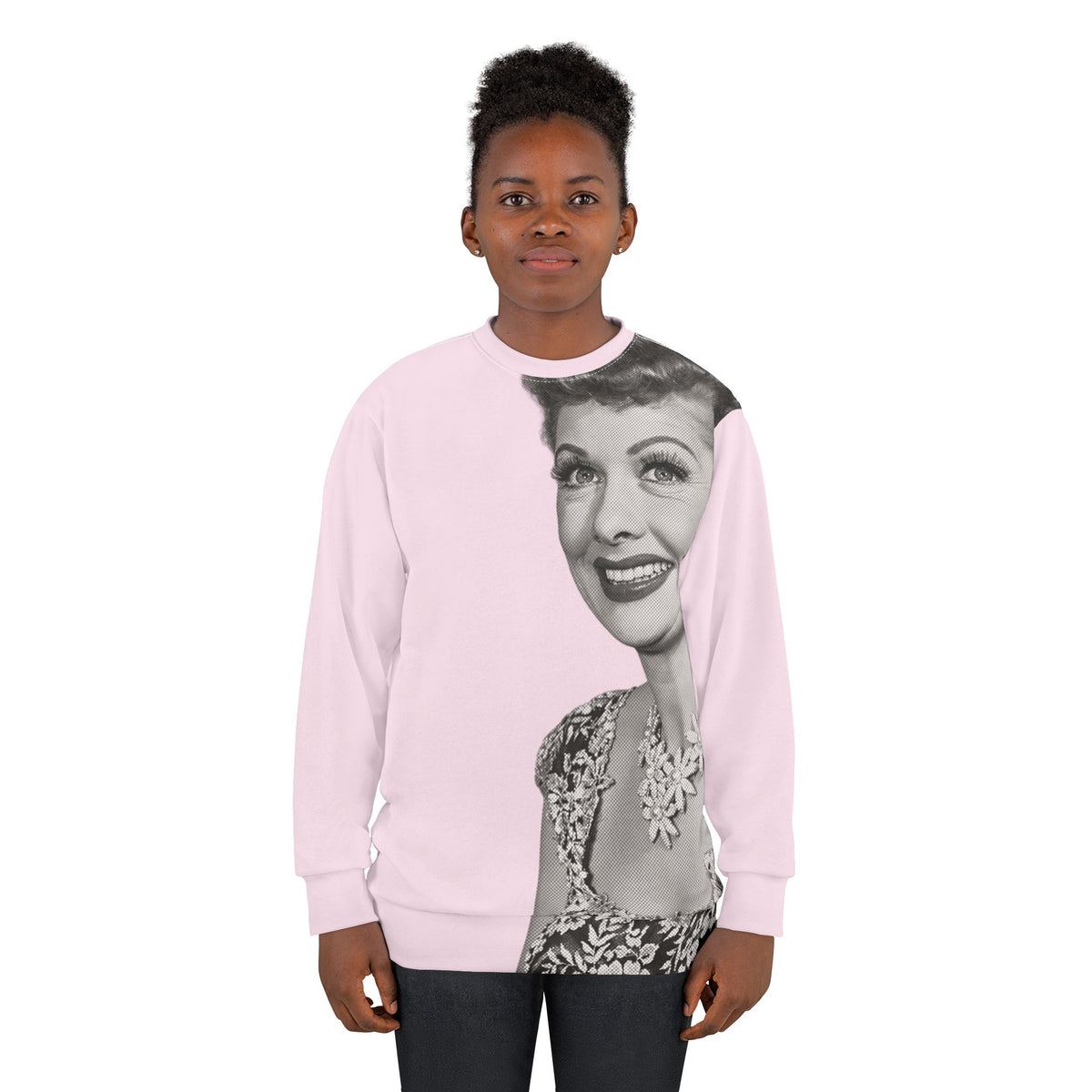 Female model wearing pink Lucille Ball graphic sweatshirt with black and white portrait