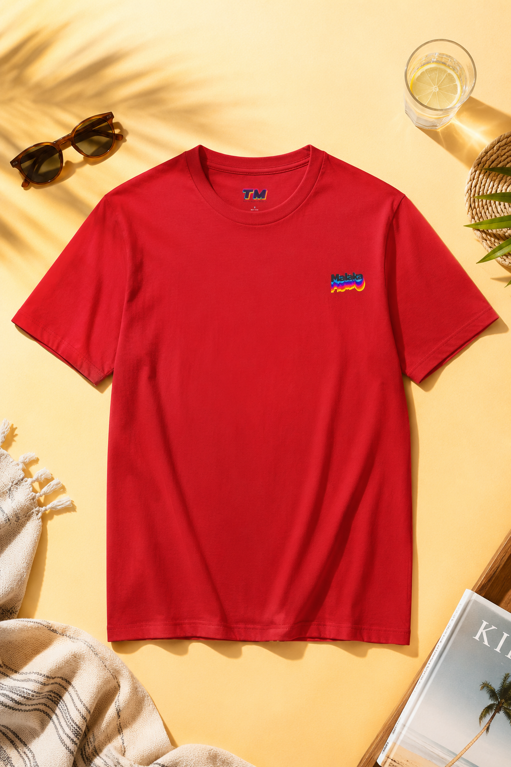 Red Malaka Greek slang T-shirt with small chest graphic on a soft yellow background