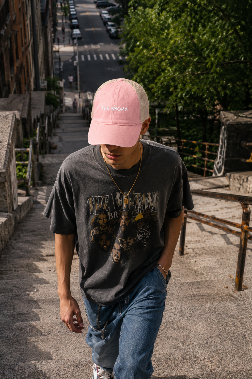 Man wearing The Bronx vintage pink trucker hat outdoors