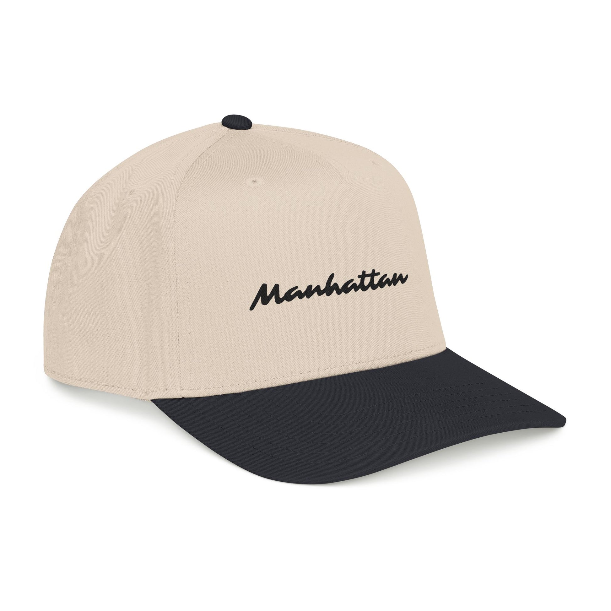 Side-angle view of the Manhattan Baseball Cap – Two-Tone featuring a charcoal visor.