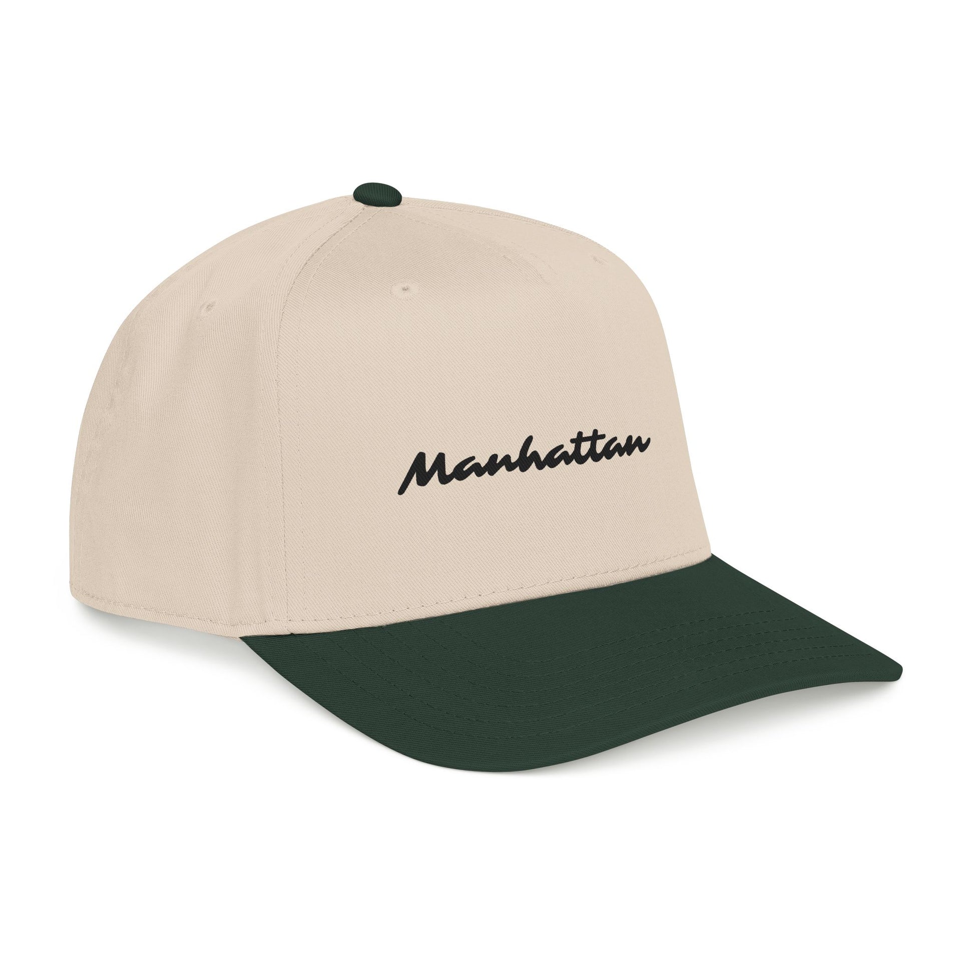 Side-angle view of the Manhattan Baseball Cap – Two-Tone featuring a forest green visor.
