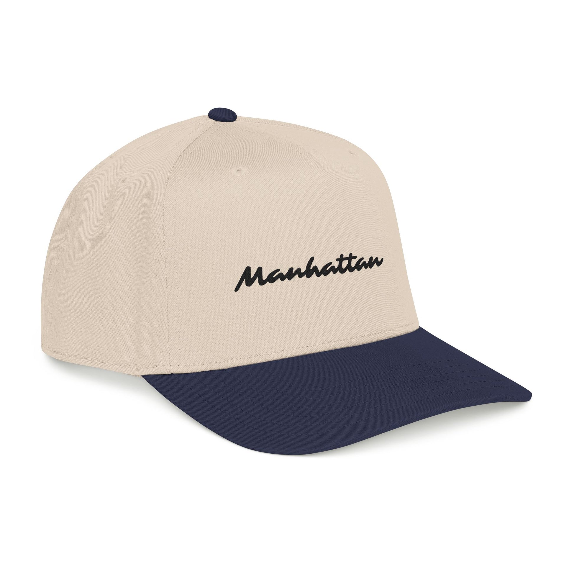 Side-angle product view of the Manhattan Baseball Cap – Two-Tone with navy visor.