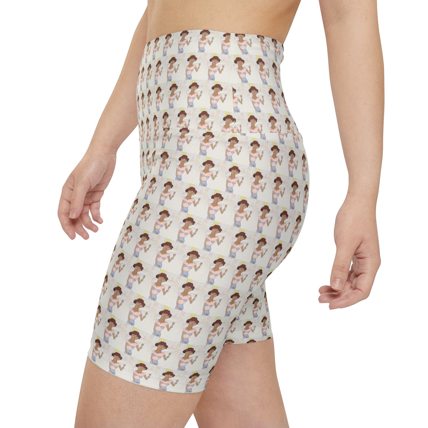 Side view of a female model wearing Morenita Art Bike Shorts featuring original artwork and comfortable activewear styling.