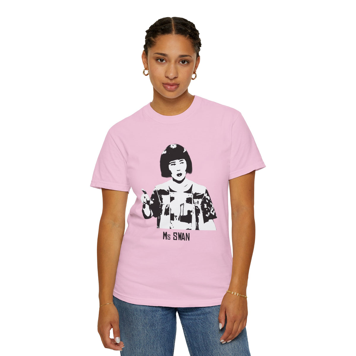 Model wearing a light pink Tantrum Media Ms Swan T-Shirt with jeans, showing the portrait and Ms SWAN lettering.