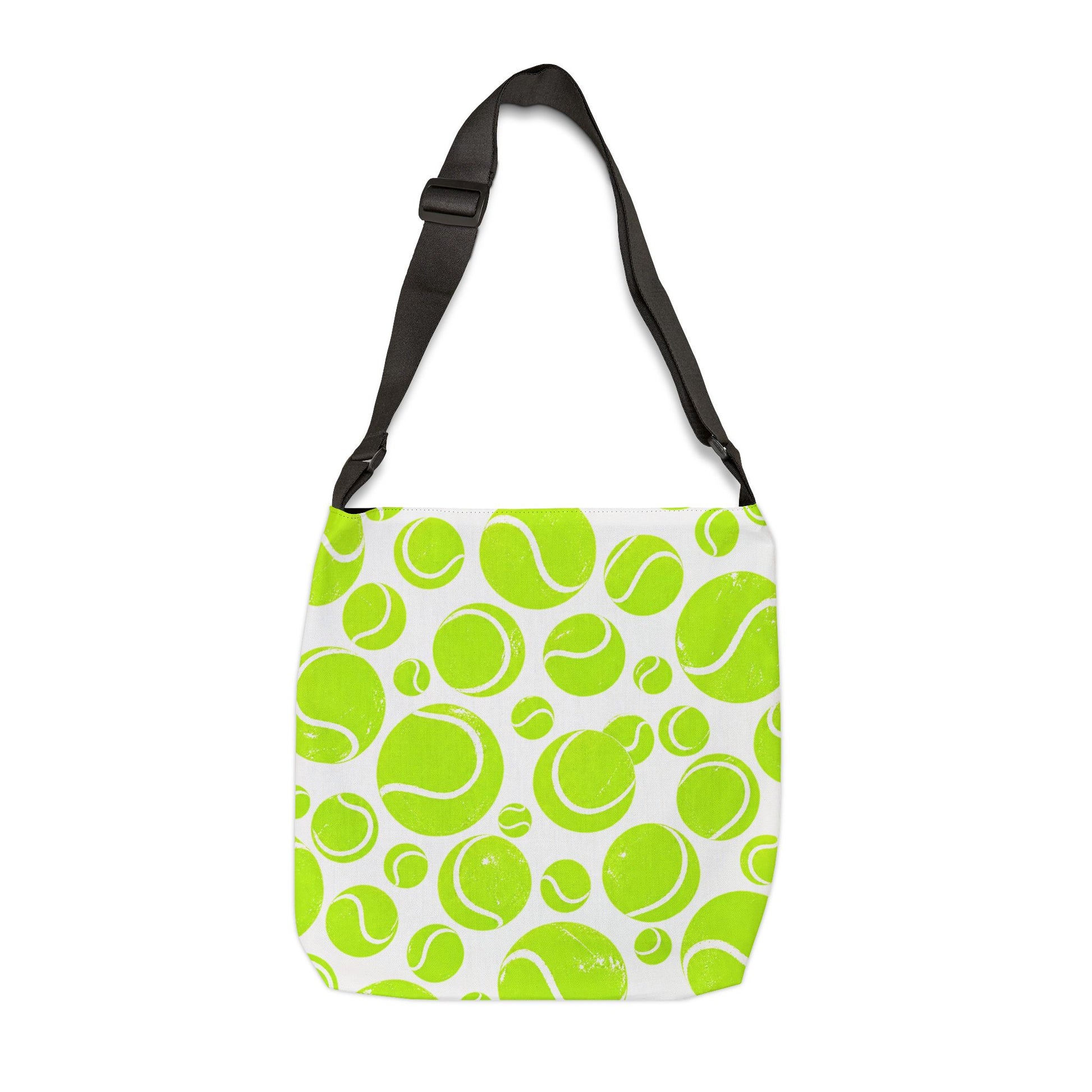 Front view of neon green tennis ball pattern tote bag with black adjustable strap