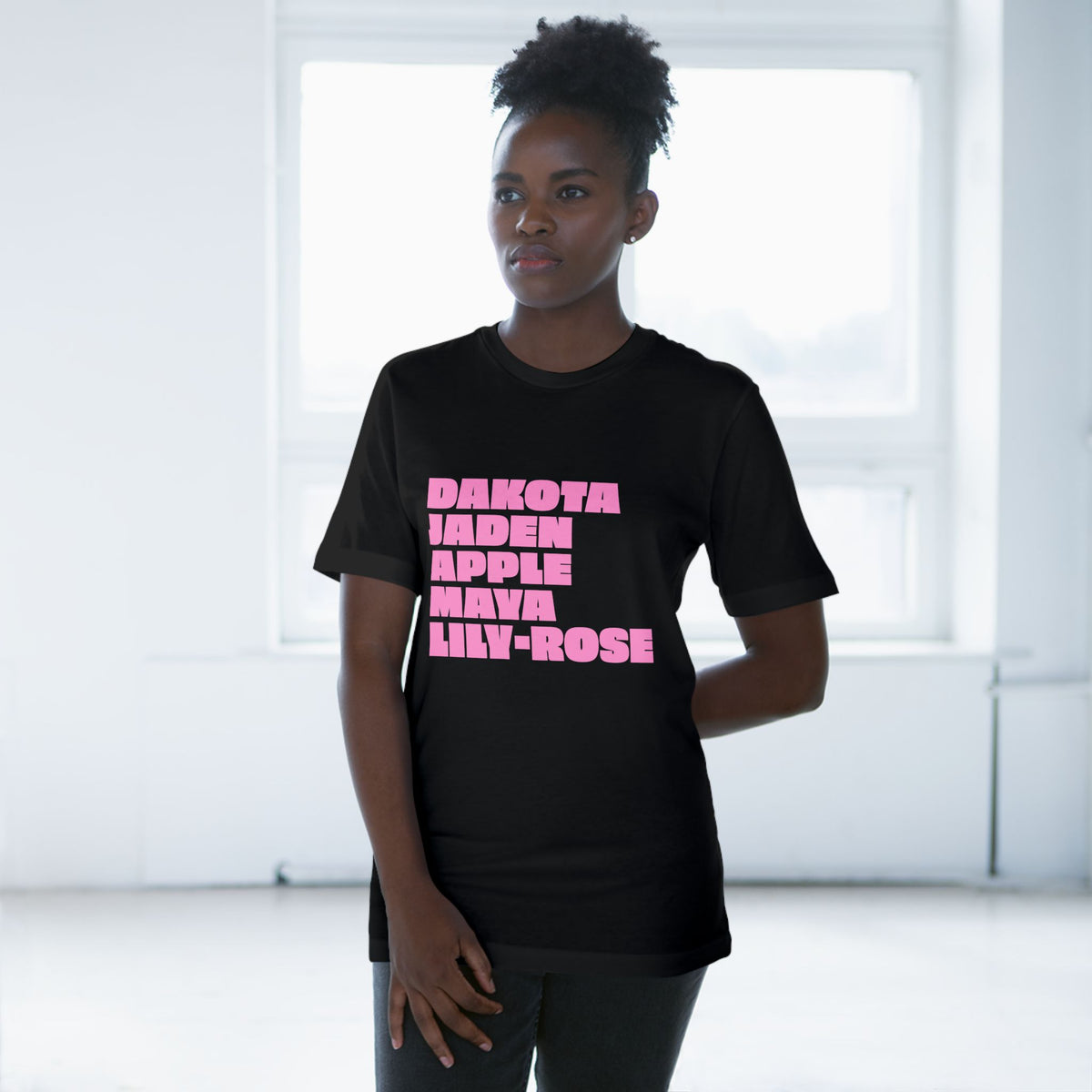 Woman wearing black Nepo Babies List social commentary T-shirt