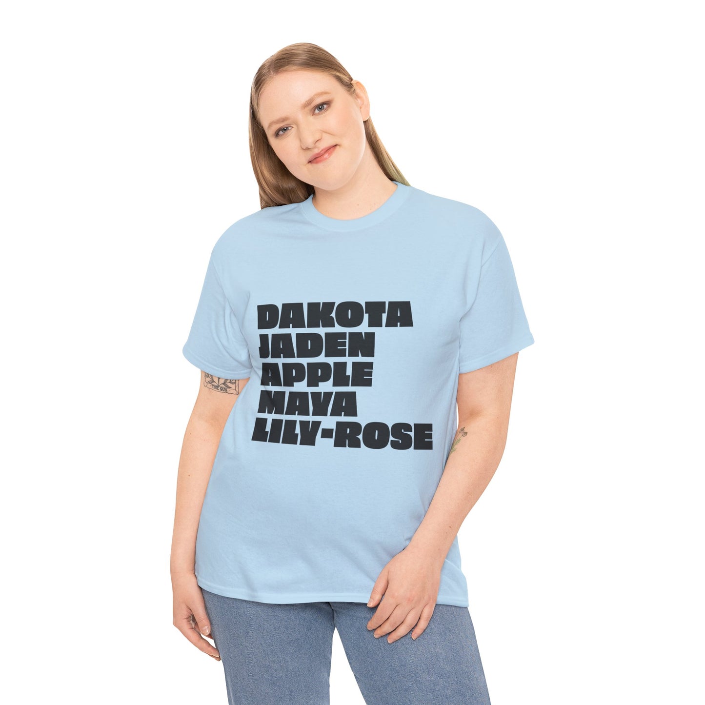 Female model wearing blue Nepo Babies List t-shirt with bold black text, relaxed streetwear style
