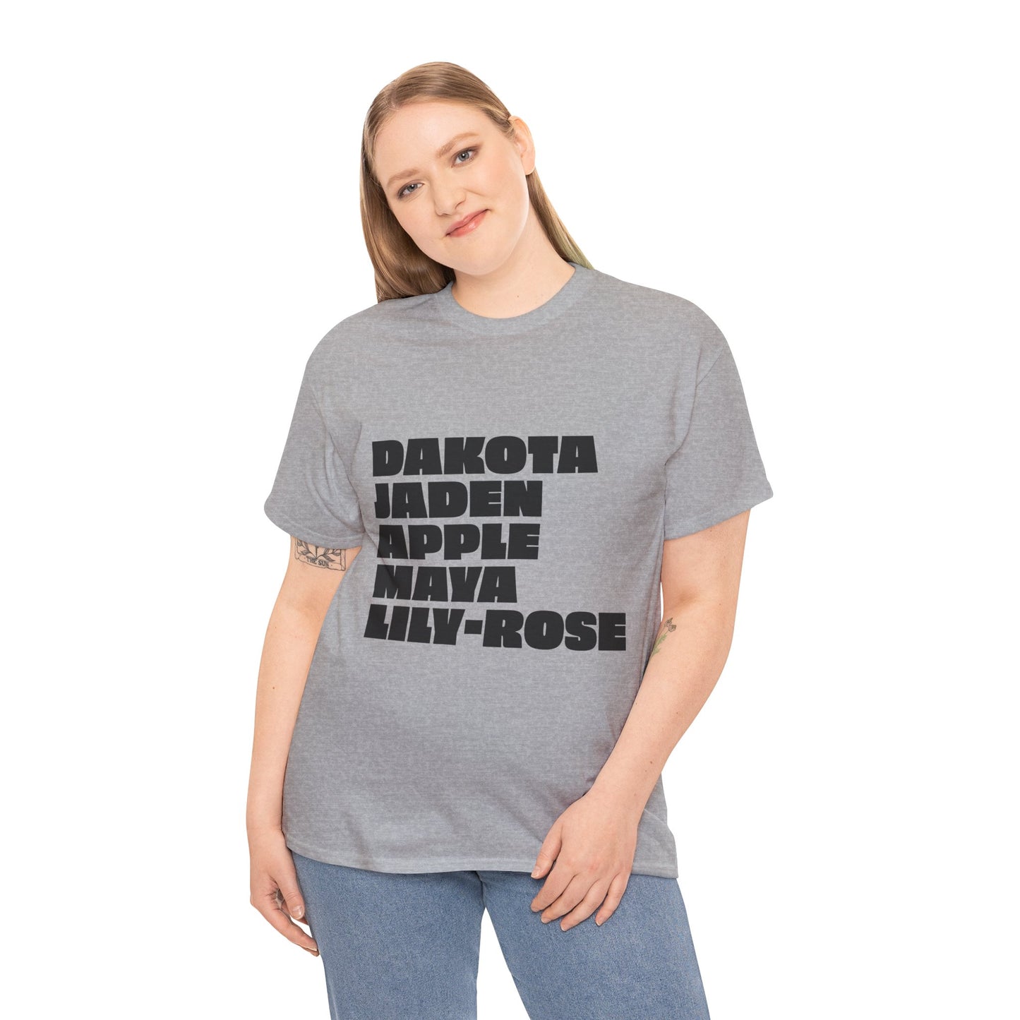 Woman wearing gray Nepo Babies List unisex t-shirt with bold black text, front view streetwear style