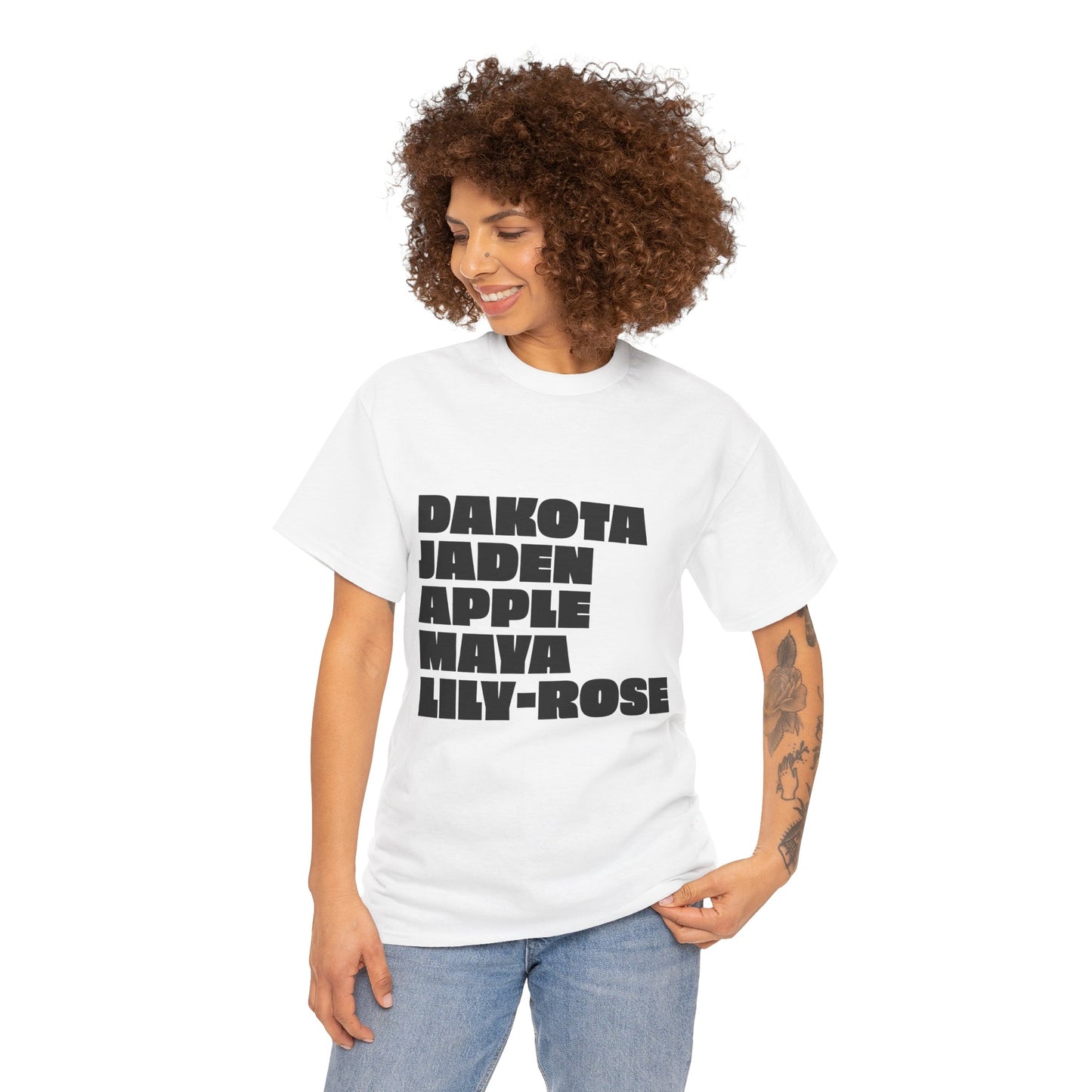 Female model wearing white Nepo Babies List t-shirt with bold black text, relaxed streetwear fit
