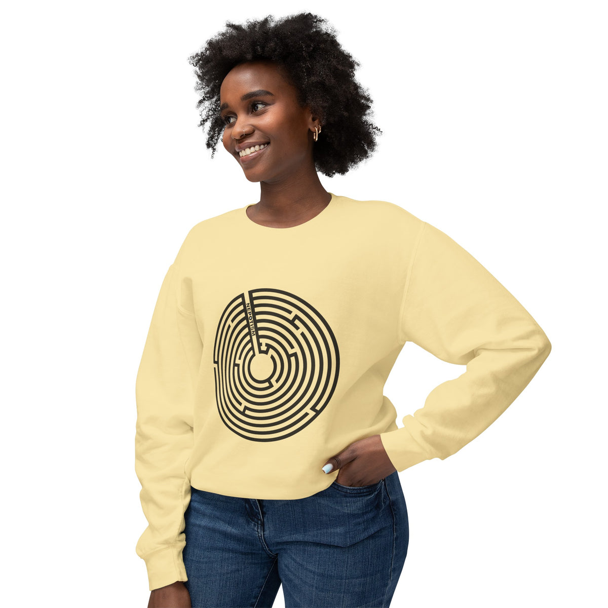 Female model wearing a yellow Nepo sweatshirt with black anti-nepotism maze graphic.