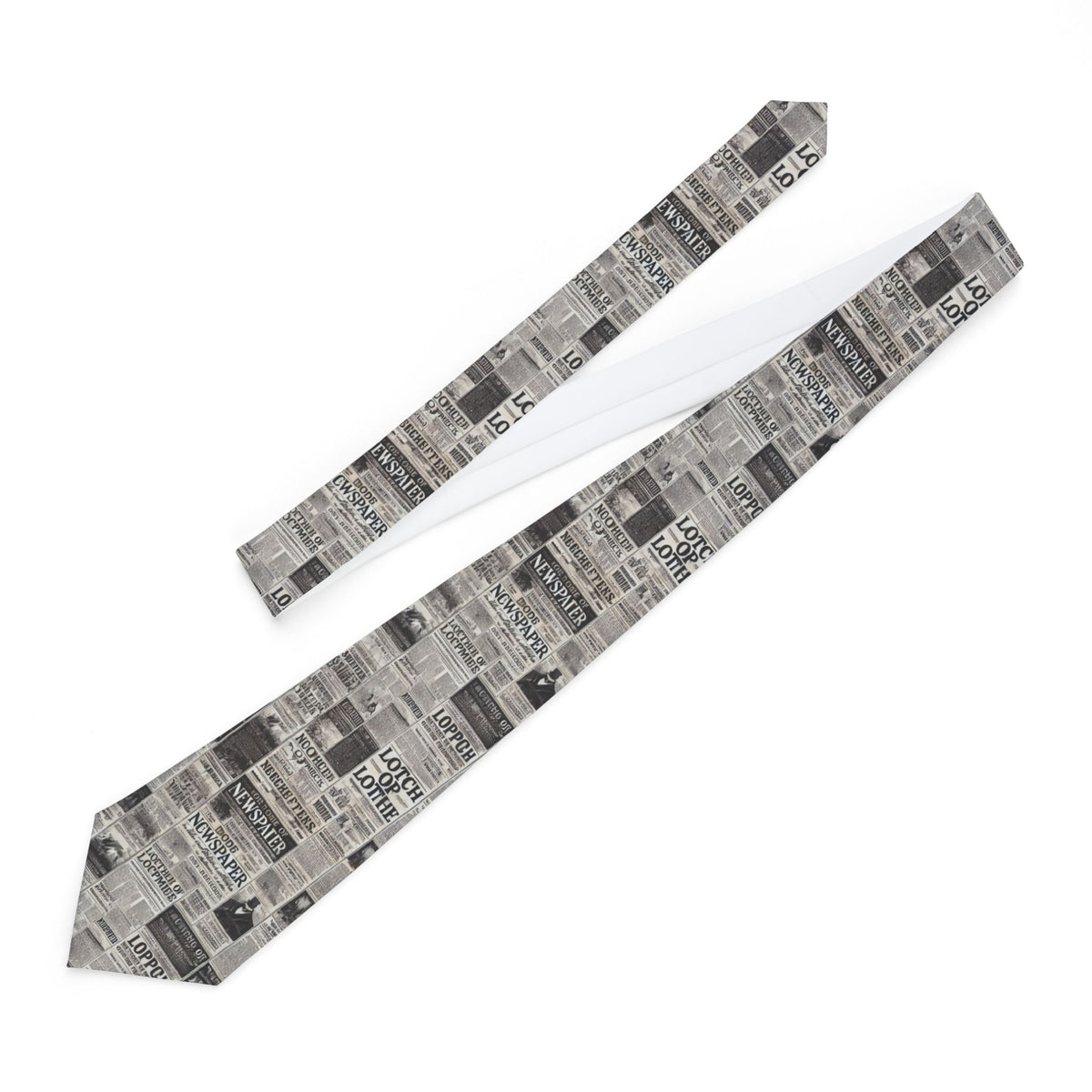 Full-length newspaper print necktie laid on white, showing the pattern across its wide and narrow ends.