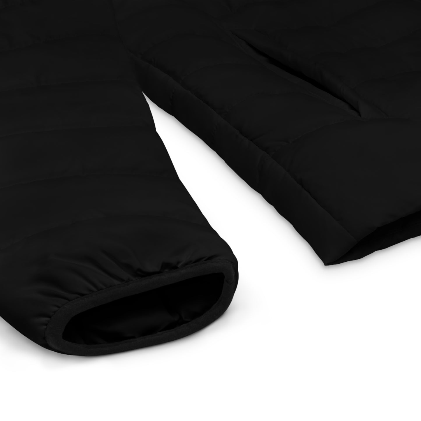 Close-up of the sleeve and cuff detail on the black Pac-Man puffer jacket.