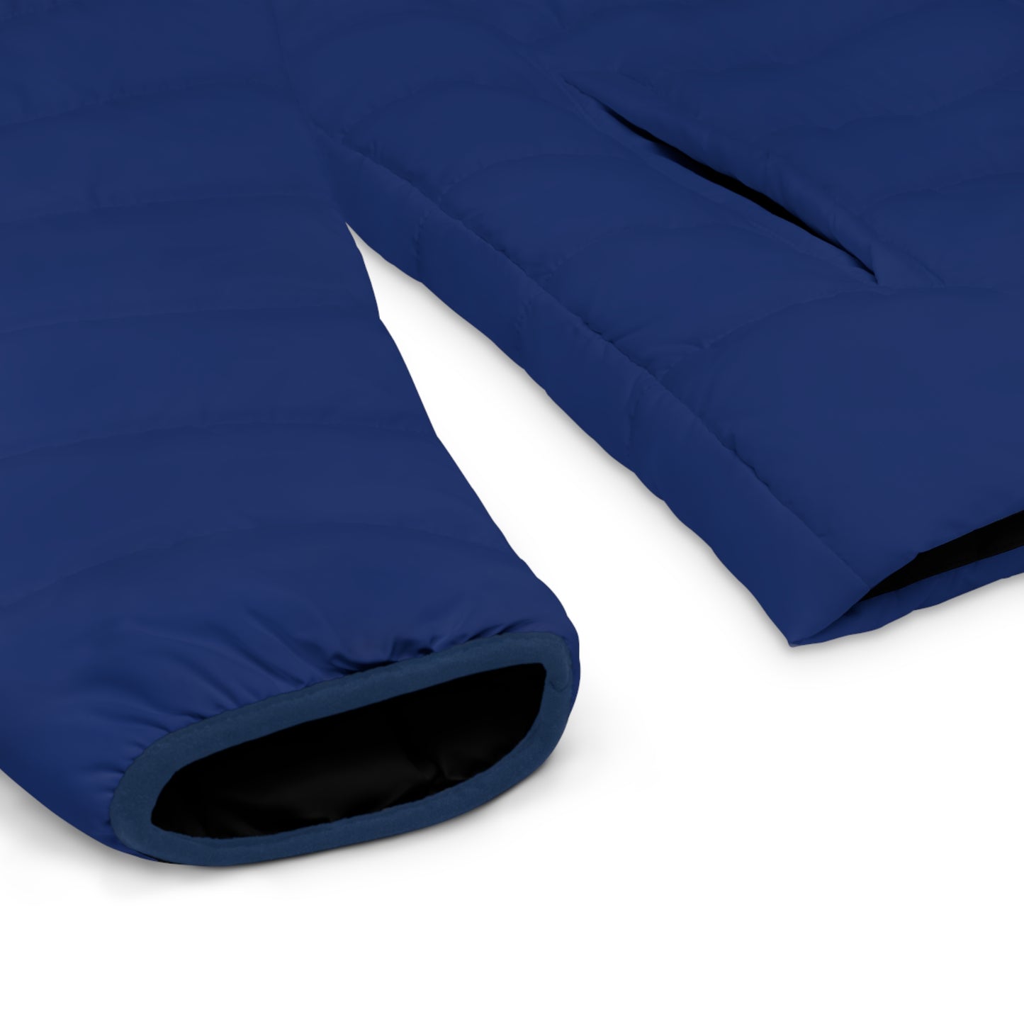 Close-up of the sleeve and cuff detail on the blue Pac-Man Blinky Ghost puffer jacket.