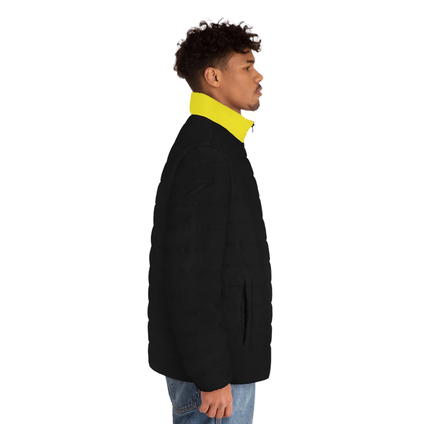 Side view of a male model wearing the Pac-Man men’s black and yellow puffer jacket.