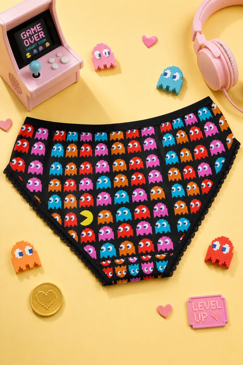 Back view of Pac-Man women’s briefs with colorful arcade ghost print on a soft yellow gaming background