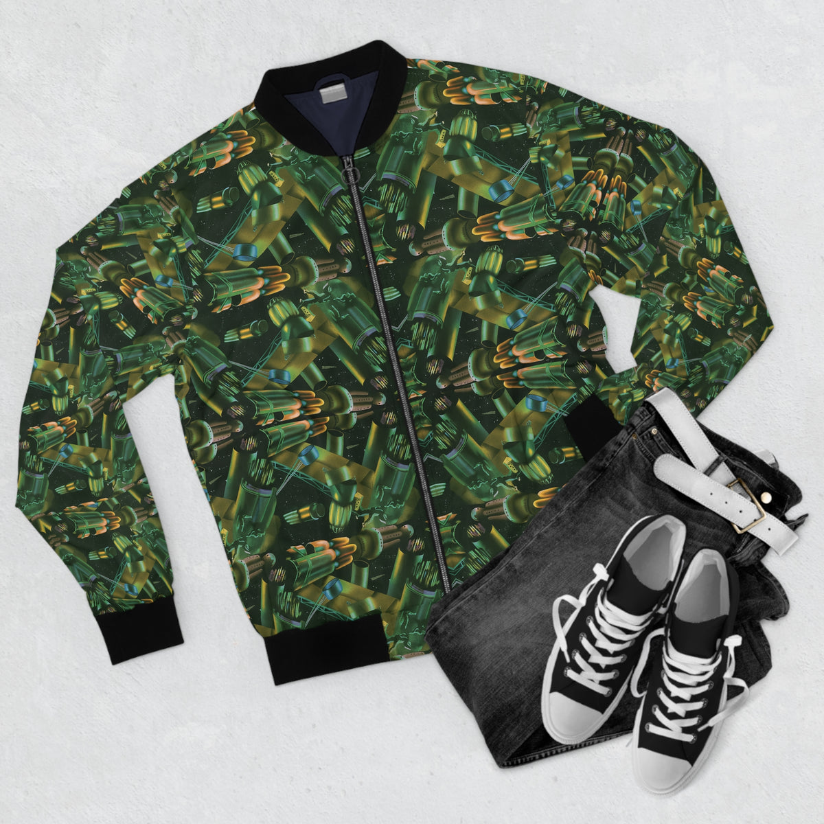 Flat lay of the Passengers Men’s Bomber Jacket with green all-over pattern styled with black sneakers