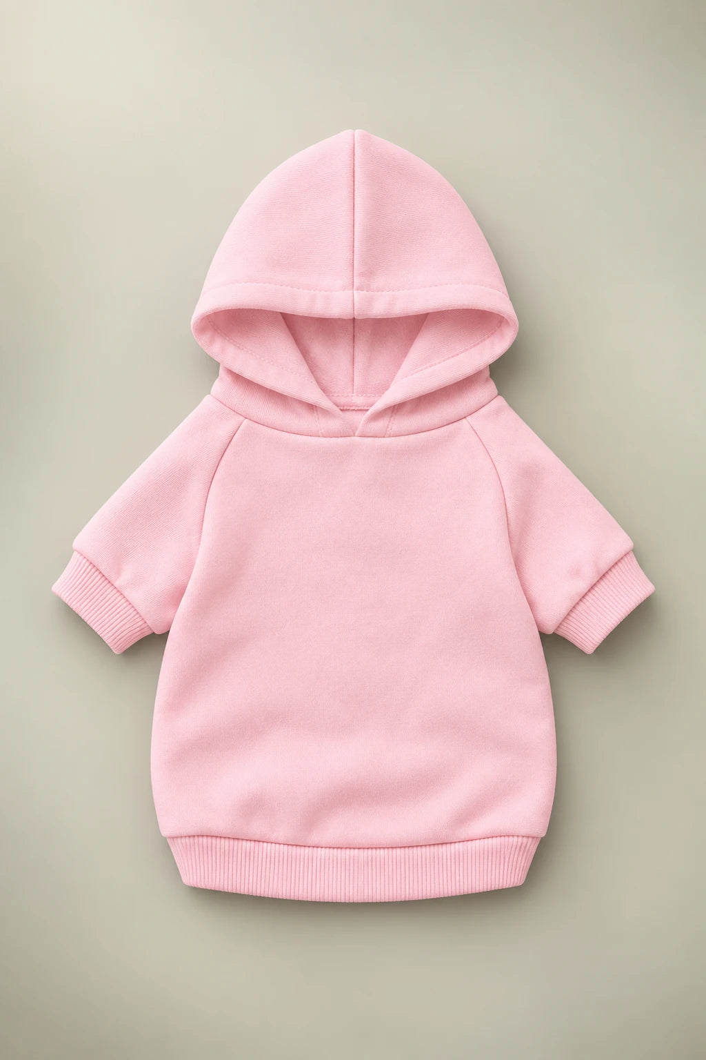 Pink pet hoodie front view with plain pullover design and ribbed trim