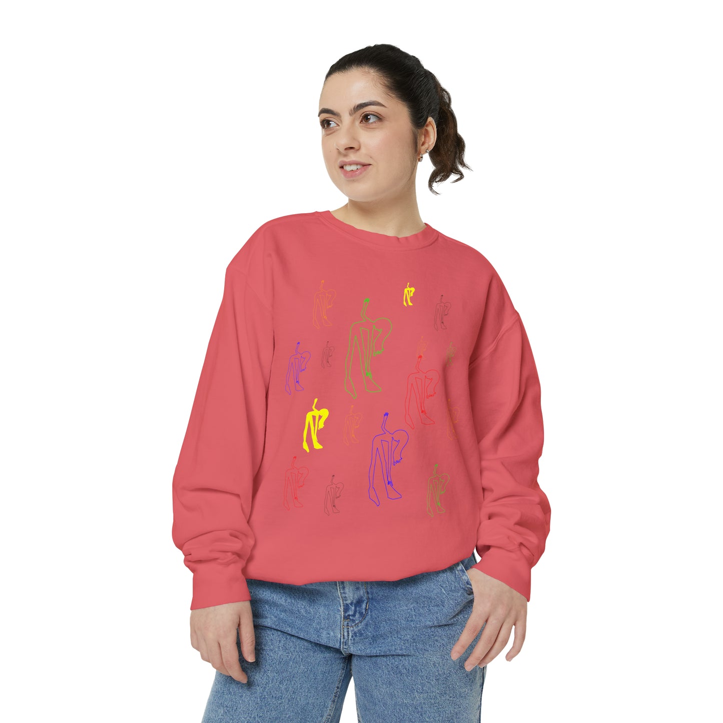 Woman wearing the coral Patsy Unisex Sweatshirt with hand-drawn graphic artwork
