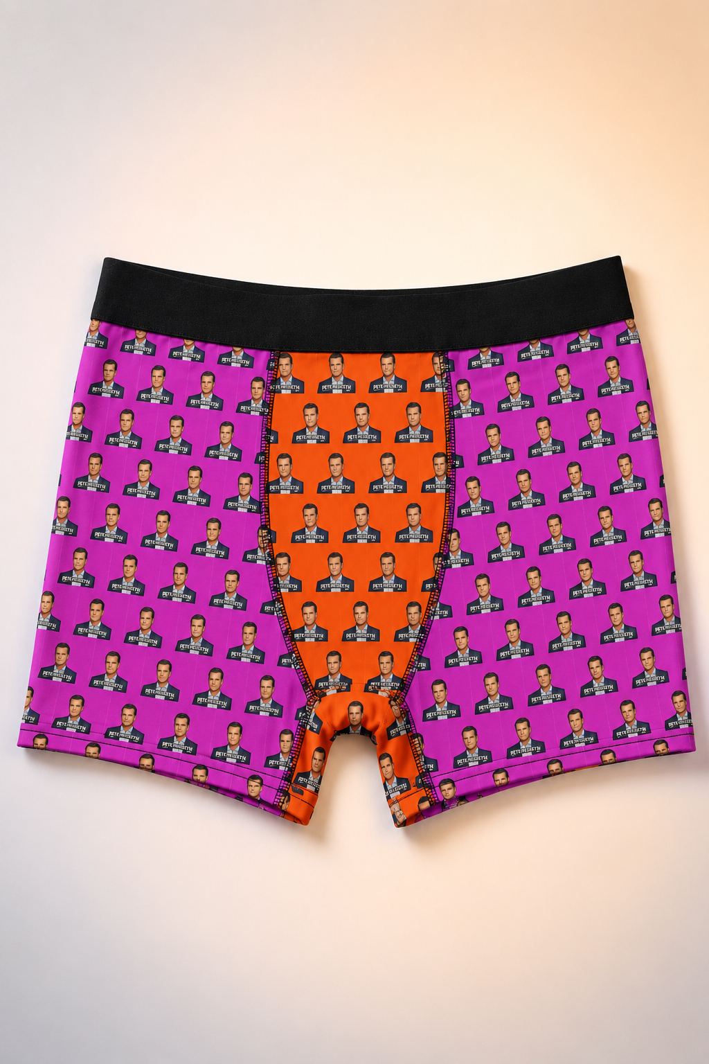 Front view of Pete Hegseth men's boxer briefs featuring an all-over portrait print and orange front panel.