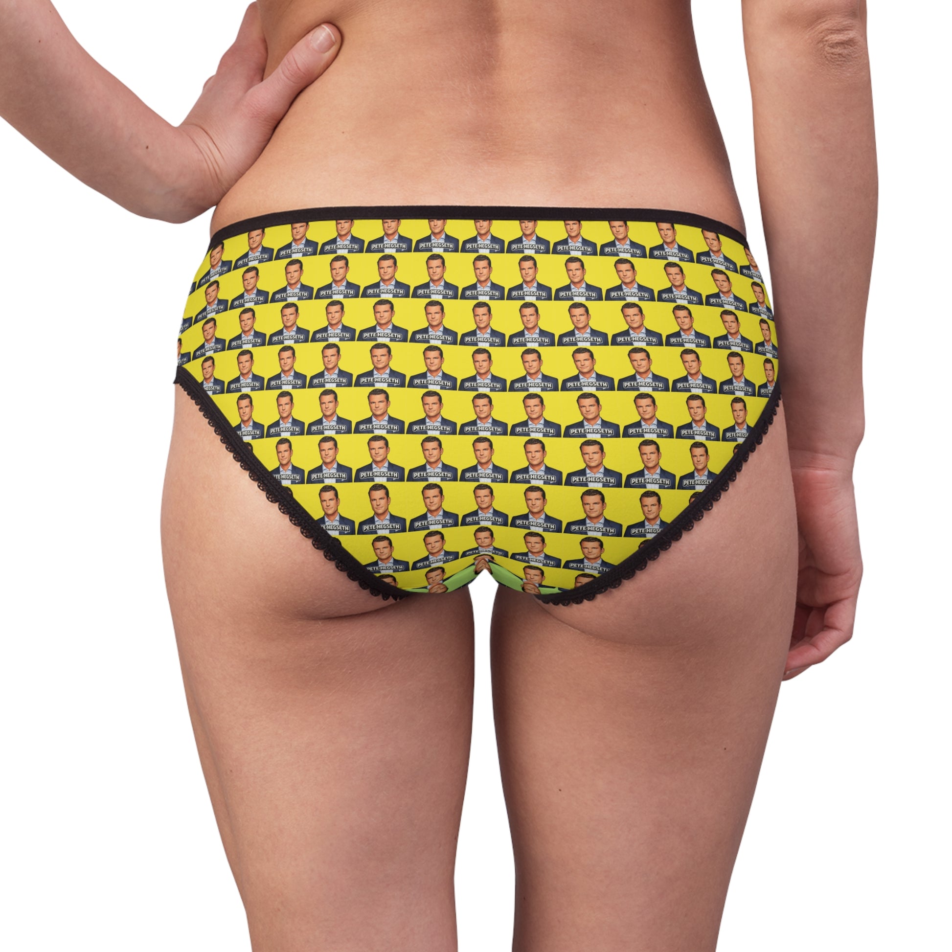 Rear model view of Pete Hegseth women's panties with repeating portrait pattern and black trim.