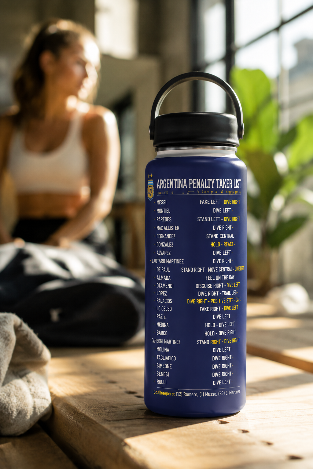 Close-up of the Pickford Penalty Cheat Sheet insulated stainless steel water bottle in a bright gym setting.