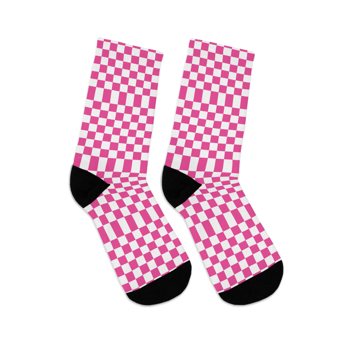 Pair of pink checkerboard crew socks with black heel and toe accents on a white background.