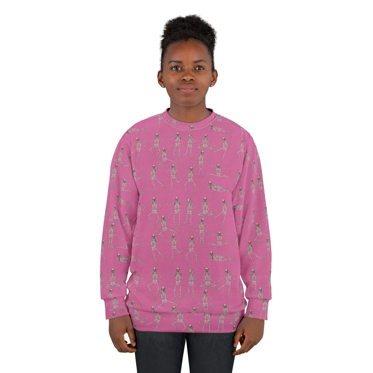 Female model wearing the Pink Dancing Skeletons Sweatshirt with all-over skeleton print