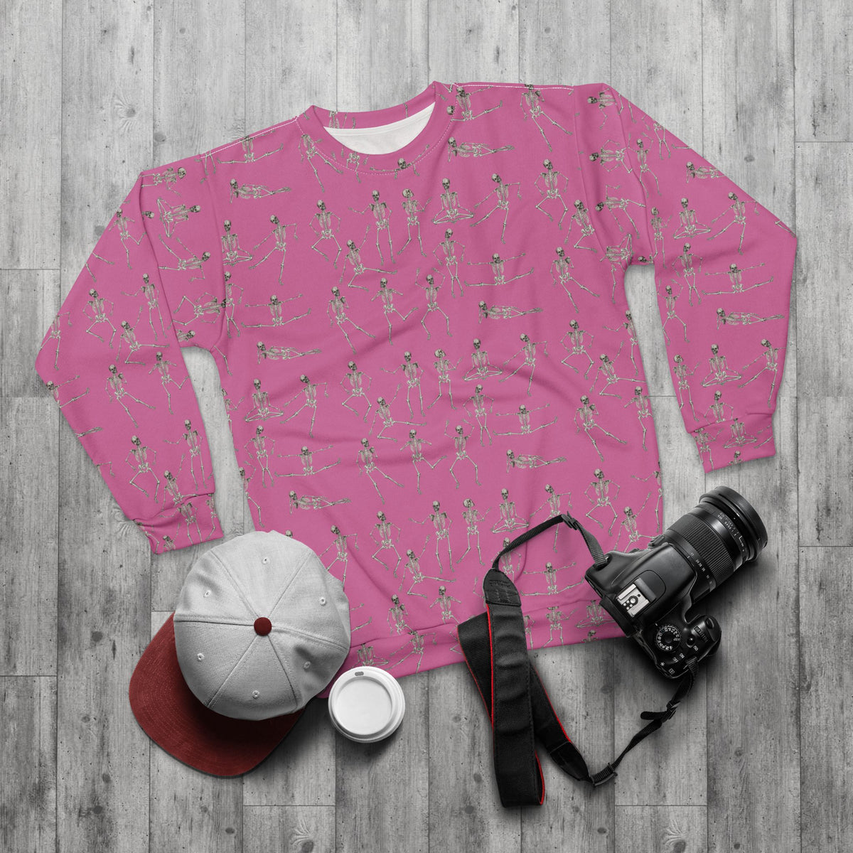 Pink Dancing Skeletons Sweatshirt styled flat lay with casual streetwear accessories