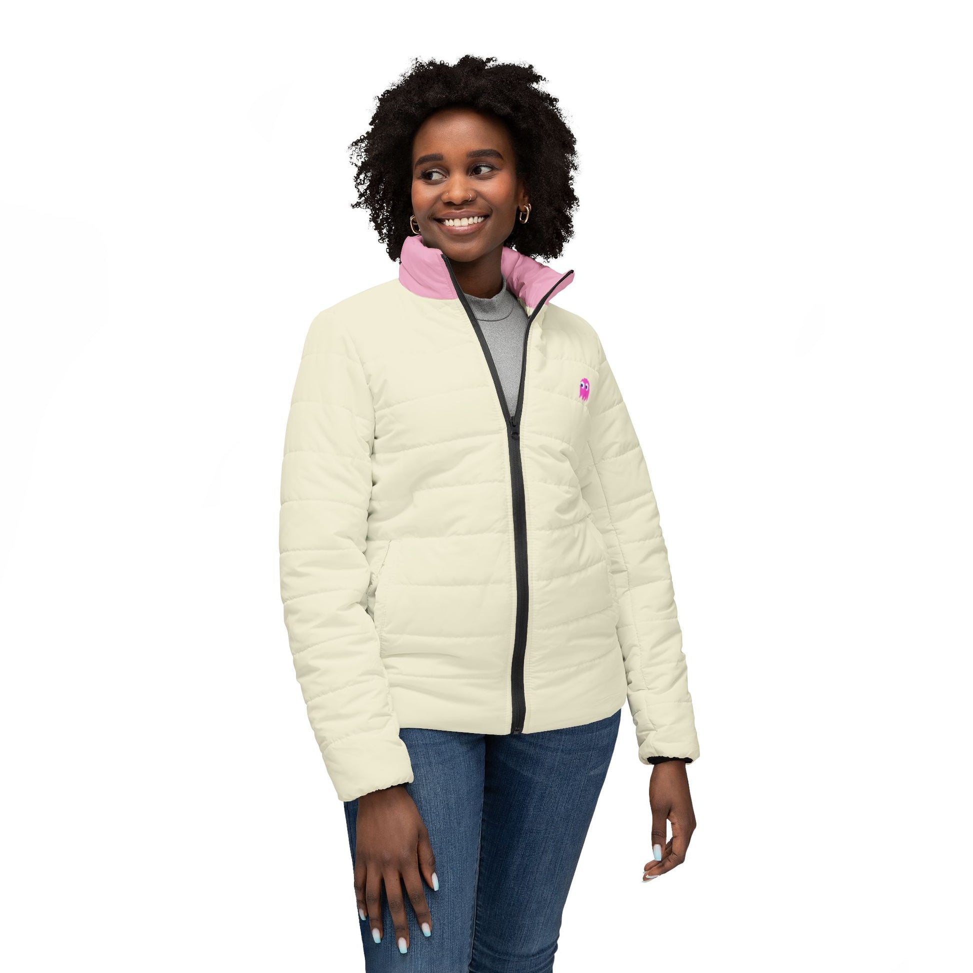 Woman modeling cream gaming puffer jacket with pink collar and pixel ghost graphic