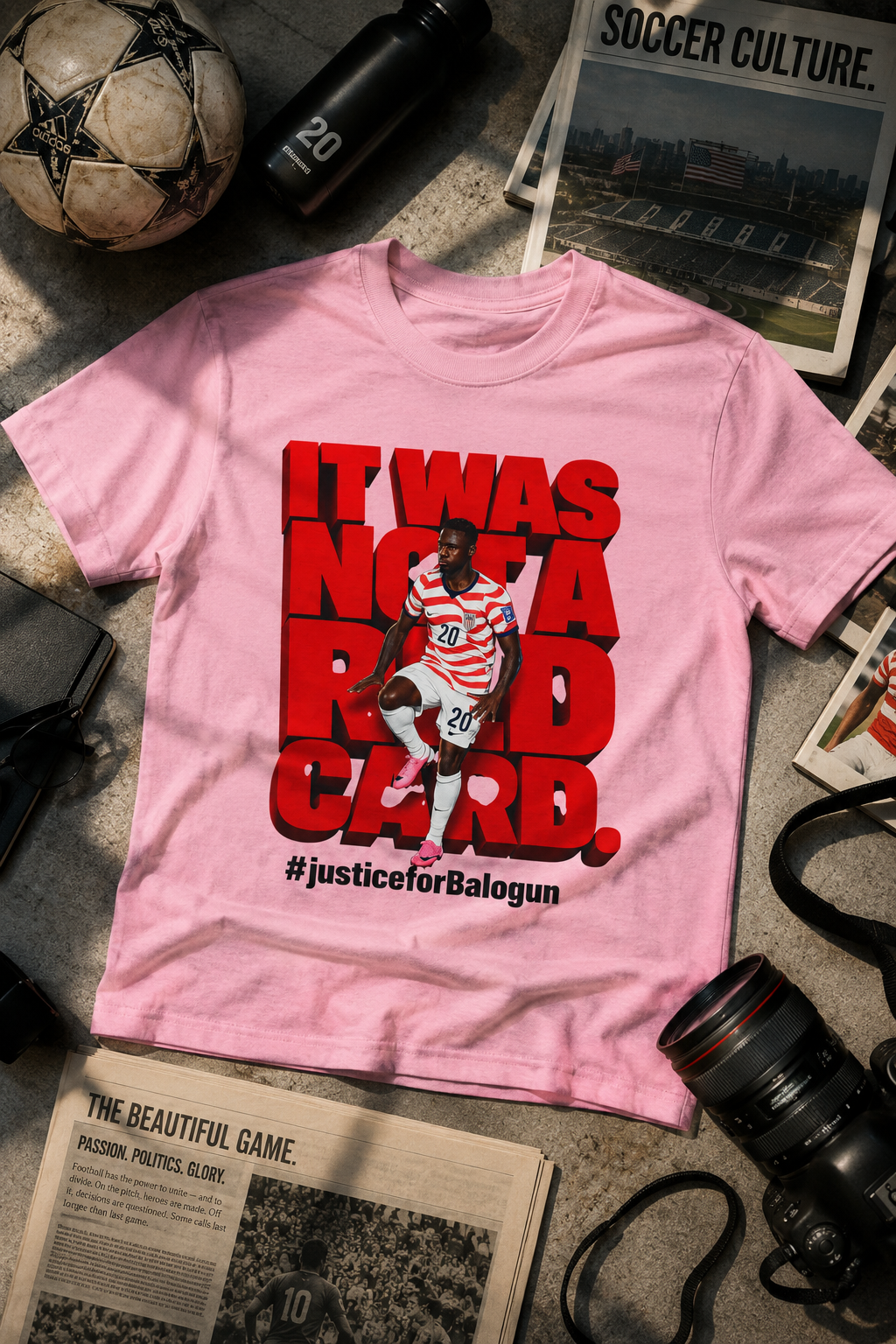 pink It Was Not a Red Card Balogun soccer graphic t-shirt flat lay mockup