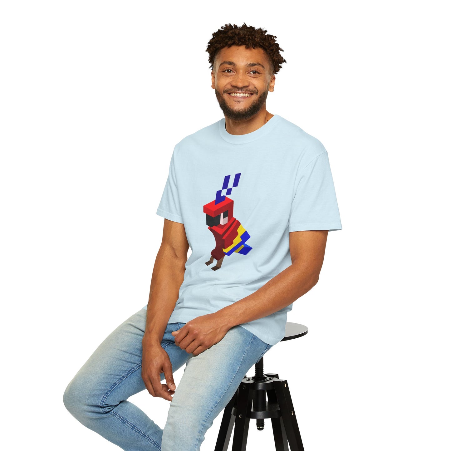 male model wearing light blue pixel art parrot t-shirt, unisex retro gaming graphic tee, seated pose