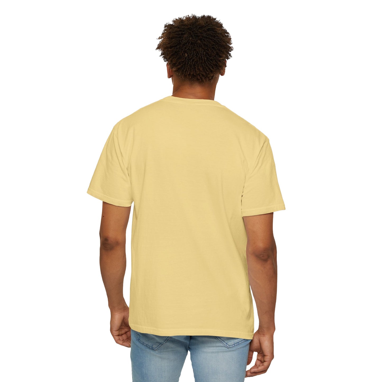 Back view of a pale yellow Prima Facie unisex graphic T-shirt worn by a young male model against a clean studio background.