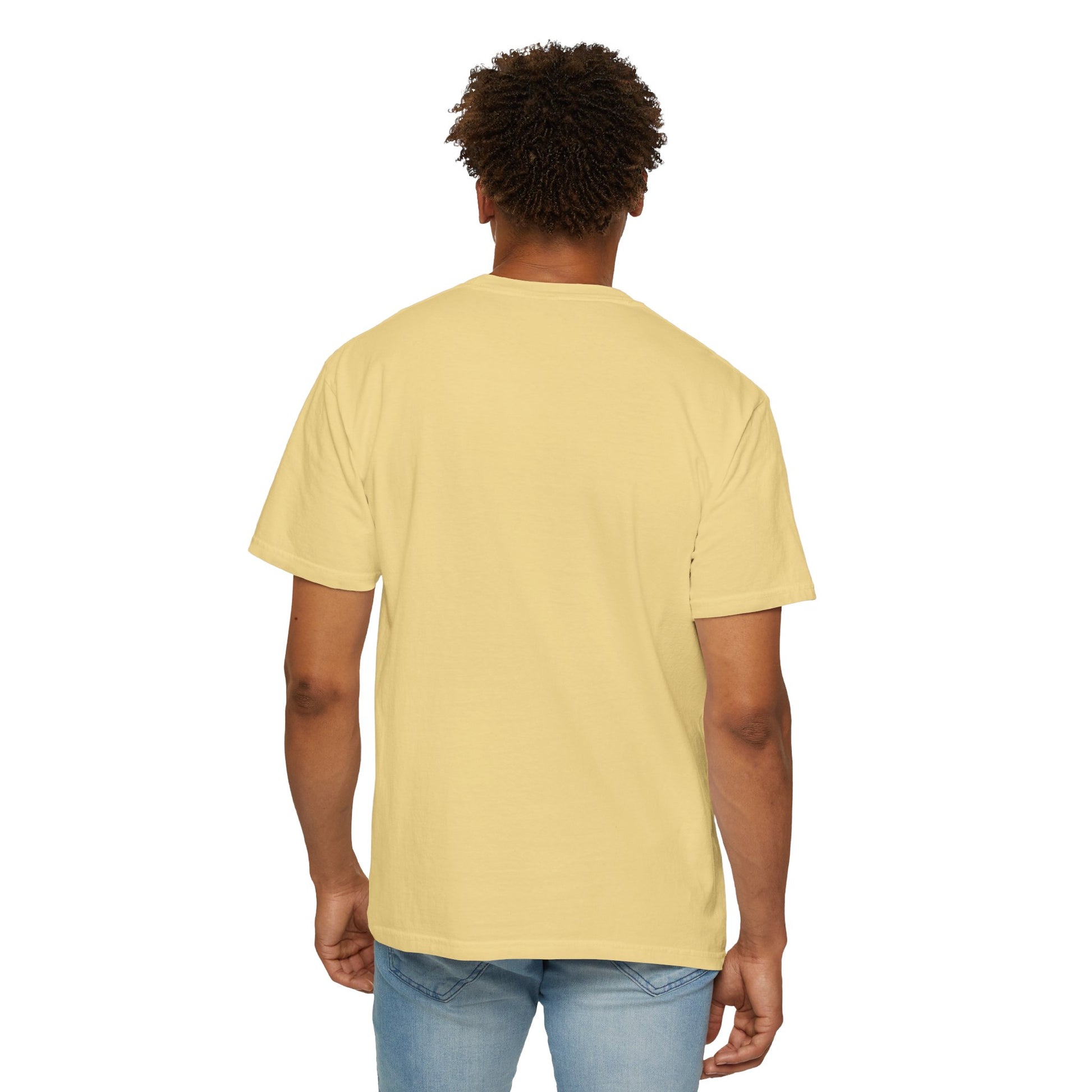 Back view of a pale yellow Prima Facie unisex graphic T-shirt worn by a young male model against a clean studio background.