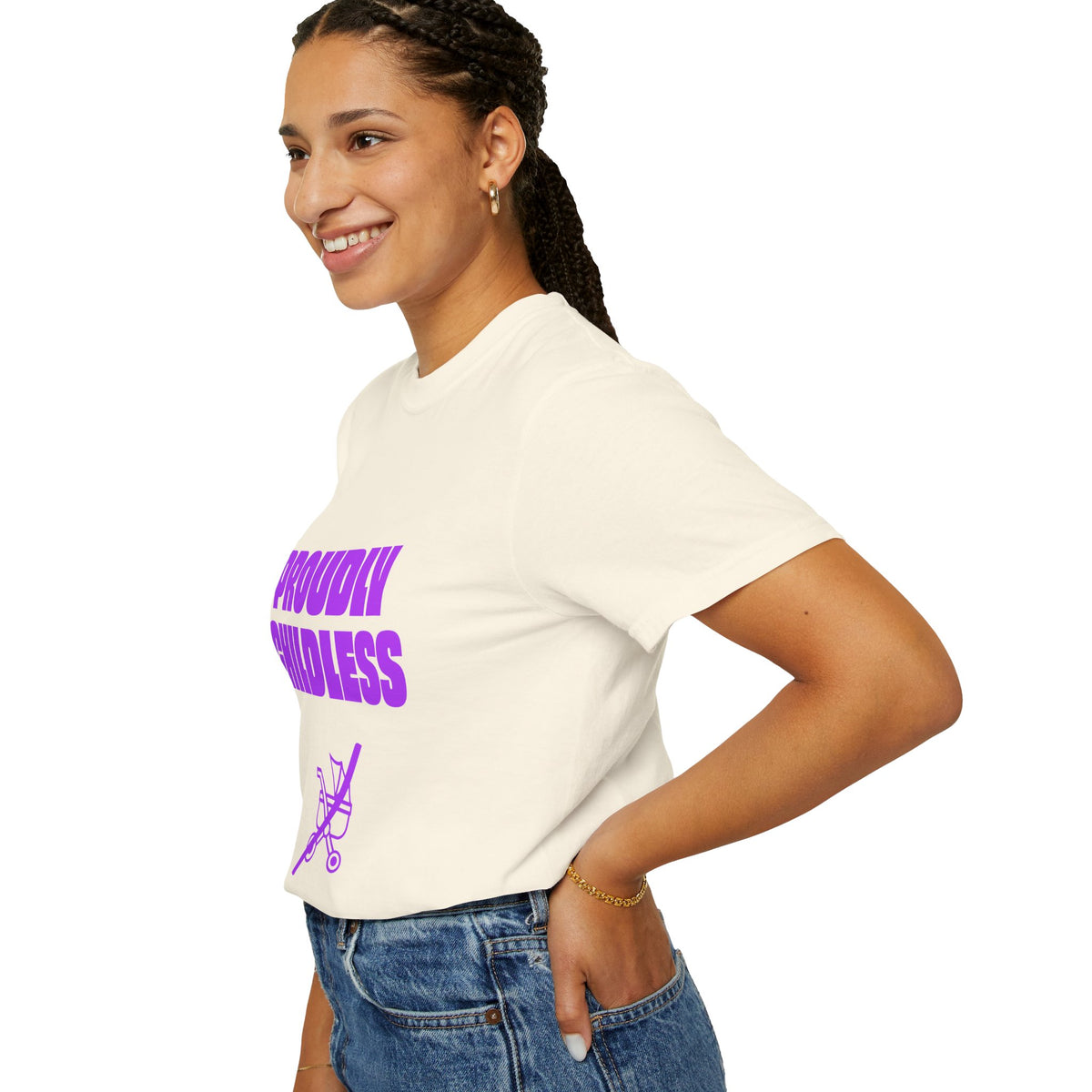 Female model wearing a cream Proudly Childless graphic T-shirt shown from the side